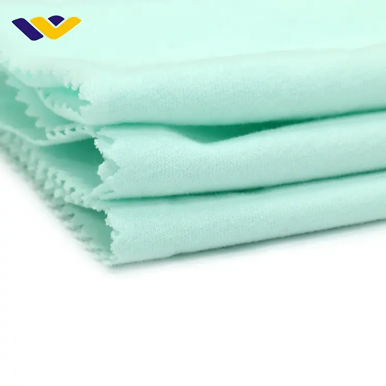 Algodón orgánico Spandex Single Jersey tejido de punto transpirable liso teñido para prendas de niños y niñas ligeras