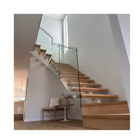 Escalier flottant moderne pour maison, à poutre simple, structure en acier, marches en bois, garde-corps en verre