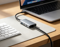 Base de Conexión para Laptop 4 en 1 USB-C Metálica con VGA 2.0, USB 3.0, Carga PD de 100W y Enchufes EU/US en Stock