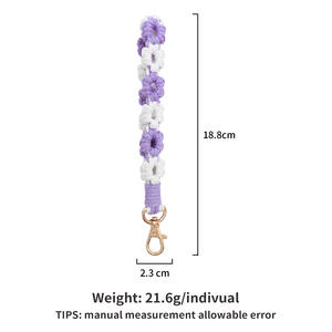 Porte-clés en peluche tissé à la main bohème populaire à la vente chaude avec impression UV, design créatif de fleur tricotée pour femmes - Product Image 5