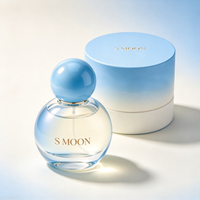 Nouvelle conception, flacon de parfum en verre mignon de 50 ml et 100 ml avec bouchon à bille coloré et boîte, flacon en verre vide personnalisé de 30 ml et 75 ml pour parfum