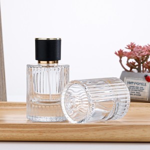 ขวดน้ำหอมแก้วแบบเติมได้ขนาด 30 มล. 50 มล. 100 มล. หรูหราสั่งทำพิเศษพร้อมฝาปิดแบบสกรีน - Product Image 1