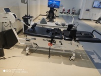 Lit de décompression de la colonne vertébrale réglable professionnel personnalisé en usine Table de traction cervicale Table de chute chiropratique électrique