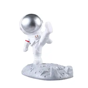 اليدوية الراتنج رائد الفضاء البيت ديكور مضحك رائد فضاء تمثال رائد الفضاء 3d داخلي الخليوي حامل هاتف المحمول الوقوف ل طاولة السرير