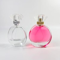 Flacon de parfum en verre épais rond personnalisé de 30 ml, 50 ml, 100 ml avec bouchon noir, pompe à pression anti-fuite, impression sérigraphique