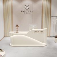 Comptoir de réception, comptoir de caisse pour salon de beauté, magasin de vêtements, salon de coiffure, bar d'angle octogonal incurvé sur mesure en MDF pour hôtel avec éclairage LED