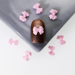 100 pièces/sac nœud papillon Nail Art décorations résine arc couleur pièces Mini nœud ruban Nail Art <span class=keywords><strong>strass</strong></span> ongles breloques déco pièces - Product Image 6