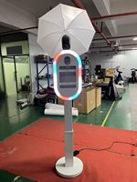 Nouvelle tendance DSLR Photo Booth Strong Shell Portable et personnalisable 11 12.9 13 Flash Light et parapluies en option avec Flight Case