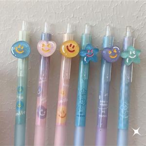 Mignon et Joyeux : Stylo mécanique 0,5 mm avec breloque en plastique pour visage, idéal pour l'école, les enfants et le bureau, avec décoration holographique étoile et cœur sur le stylo. - Product Image 6