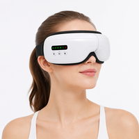 Masque de massage oculaire électrique chauffant OEM en gros avec compression d'air, vibration, musique, rechargeable par USB, appareil de relaxation oculaire
