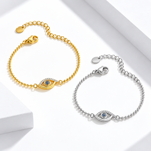 Gold and Silver Color Eye Motif Zirconia Chain Bracelet, Stainless Steel, 14K Gold Vacuum Plating, <b>Blue</b> Center - Product Image 1