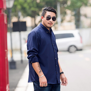 เสื้อเชิ้ตลำลองทรงหลวมสำหรับผู้ชายไซส์ใหญ่ แขนยาว สีพื้น สำหรับใส่ทำงาน - Product Image 4