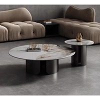 Table basse ronde en dalle de roche nordique simple, gain de place, avec matériau en bois écologique