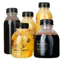 Bouteilles en plastique réutilisables de 12oz/350ml Récipients jetables avec bouchons noirs Bouteilles en PET de qualité alimentaire pour jus, lait et boissons