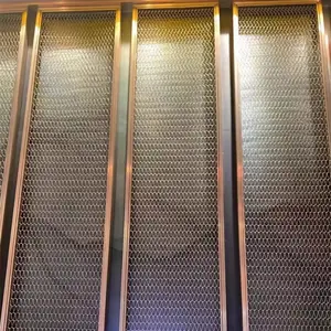 Partición de metal malla decorativa espiral metal colgante Hotel comedor techo cortina de malla dorada