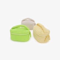 Nouvelle mode de trousse de maquillage de luxe de marque pour femmes trousse de toilette de voyage trousse à cosmétiques personnalisée rembourrée et moelleuse