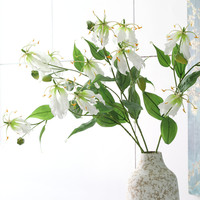 Künstliche Gloriosa-Flammenlilien Seidenblumen für Valentinstag, Muttertag, Hochzeit, Fotografie-Requisiten, Großhandel