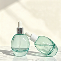 En stock, flacon compte-gouttes rond en verre de 50 ml, flacon de recharge pour sérum d'huile essentielle pour le visage