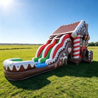 Château gonflable de Noël personnalisé en forme de maison de pain d'épices avec double toboggan