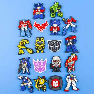 Diseño personalizado Anime dibujos animados Logo PVC goma Zueco zapato encantos para accesorios de decoración - Product Image 1