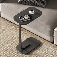 Table basse moderne et minimaliste pour salon, avec structure en acier inoxydable et plateau en bois massif, petite taille, grande valeur esthétique