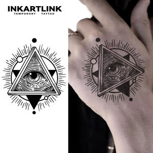 สติกเกอร์ลาย<span class=keywords><strong>สัก</strong></span>สมุนไพรรูปสามเหลี่ยมดวงตาที่มองเห็นได้ทุกสิ่ง กันน้ำ ติดทนนาน 15 วัน <span class=keywords><strong>ลาย</strong></span>กึ่งถาวรสำหรับตกแต่งร่างกาย บริเวณมือและข้อมือ - Product Image 1