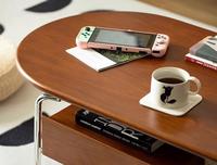 Table basse ovale minimaliste et industrielle moderne Meubles de salon en bois de cerisier avec pieds en acier inoxydable