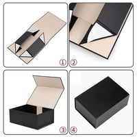 Boîte cadeau pliante magnétique noire en carton recyclé avec impression et laminage de luxe personnalisés, utilisée pour les vêtements