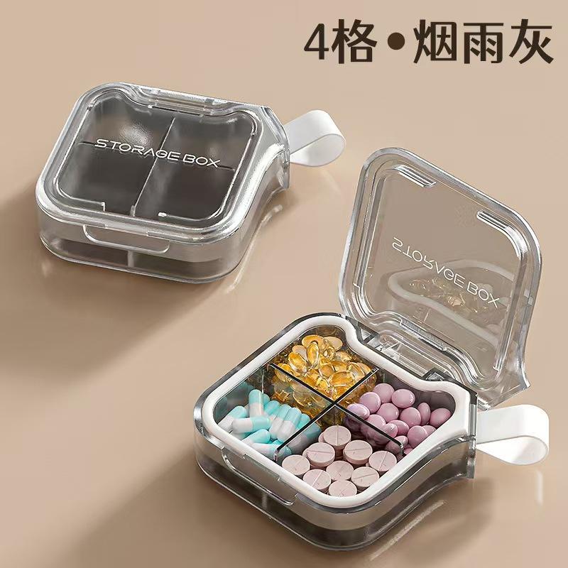 Pilulier à quatre compartiments Dopamine [gris transparent]