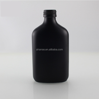 Bouteille en verre noir mat réutilisable de 100ml 200ml 250ml avec impression de logo personnalisée bouteille de café en verre à froid avec couvercle à vis noir
