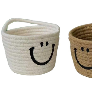 Wholesale modern fashion cotton rope storage basket can be wall hanging smiley face storage basket