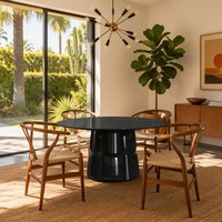 Table à manger noire brillante moderne et écologique pour projet de villa de luxe au Liban, base sculpturale capitonnée, sur mesure OEM pour hôtels