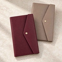 Hongbo Best-seller Portefeuille d'enveloppe de sac de caisse en cuir de galet de 14 couleurs avec bracelet pour sacs à languettes disponibles comme organisateur de budget