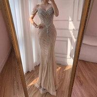 Robes de soirée sirène de luxe 2026 en cristal arabe, couleur nude/rose/gris, à épaules dénudées et perlées, pour mariages et fêtes formelles LA73128A