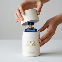 Boîte cylindrique en papier ronde élégante avec estampage à chaud en feuille d'or pour flacon de parfum de créateur, emballage personnalisé en gros