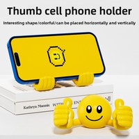 Dessin animé d'usine original pour visage souriant pouces rotatifs ornements de bureau en plastique pour téléphones mobiles/supports de tablette