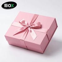 Boîte rigide pliable magnétique personnalisée en ruban rose mat noir écologique pour l'emballage de cosmétiques et de soins de la peau