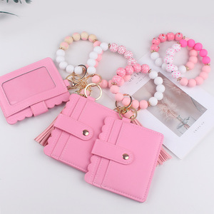 <span class=keywords><strong>2025</strong></span> mới nhất màu hồng hạt gỗ <span class=keywords><strong>Keychain</strong></span> màu hồng tua PU Túi Silicone hạt Ví ID thẻ túi vòng tay <span class=keywords><strong>Keychain</strong></span> cho Mama Quà Tặng - Product Image 1