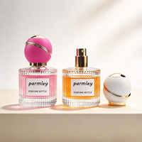 Flacon de parfum en verre transparent cylindrique vide portable de 30 ml et 100 ml avec bouchon sphérique coloré pour le transfert de parfum et le stockage de fragrances
