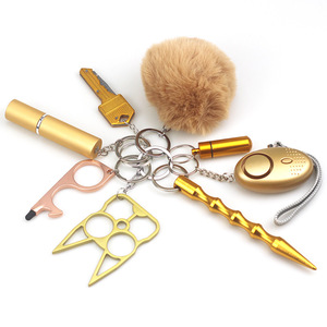 Nuovo Set Portachiavi Multifunzionale di Sicurezza con Pompon e Allarme Personale, Adatto per Strumenti di Sicurezza alla Moda per Attività all'Aperto - Product Image 5