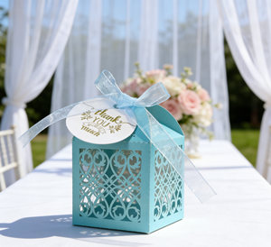 Light Blue Hollow Out Favor Box Made Of Pearlescent Cardboard With Laser Engraving And Organza Ribbon Fresh - Product Image 1