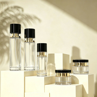Emballage de produits cosmétiques écologiques de luxe, design élégant, échantillon gratuit, ensemble de flacons et de pots en verre