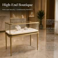 Table de présentation de bijoux en acier inoxydable doré brossé, vitrine en verre trempé avec pieds coniques pour boutique