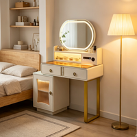 Ensemble de table de maquillage avec miroir ovale LED blanc, table de maquillage avec armoire latérale et pieds dorés pour petite chambre