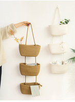 Panier de rangement mural multifonctionnel à trois niveaux en tissu de coton pour l'organisation de la garde-robe et du salon