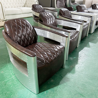 Fauteuil en cuir brun vintage fait main pour chaise, cadre en aluminium, style détente pour salon de cigares d'hôtel
