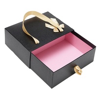 Boîte en carton personnalisée en gros avec finition UV sélective, matériaux recyclés, pour emballage d'art et de bijoux, incluant des inserts en mousse pour