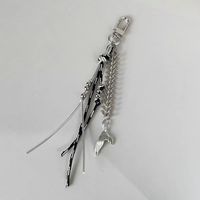 Chaîne de sac et de téléphone Y2K tendance, porte-clés punk en plastique noir et argenté, avec cordon tressé en os de serpent et pendentif perle