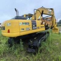 Excavatrice sur chenilles Komatsu PC220 d'occasion, 22 tonnes, moteur japonais d'origine 130 kW, idéale pour l'exploitation minière - Prix abordable