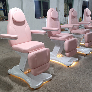 Fauteuil de massage en cuir PU rose avec siège inclinable réglable et appui-tête intégré pour usage en salon - Product Image 1